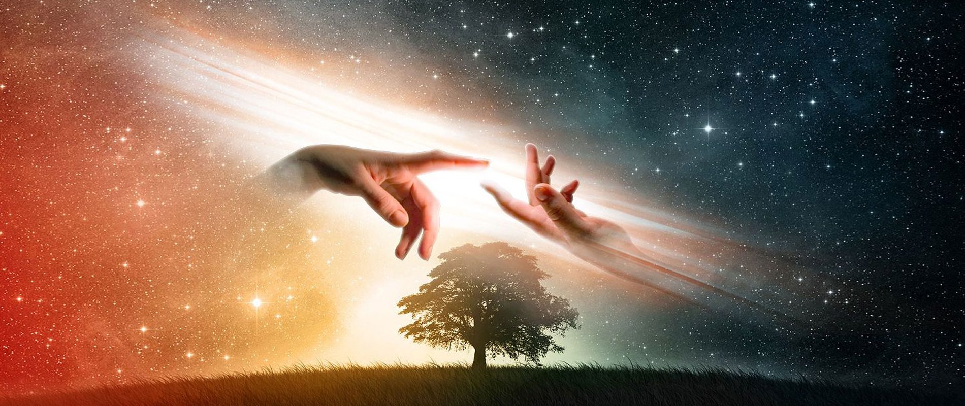A person reaching for the stars with their hands